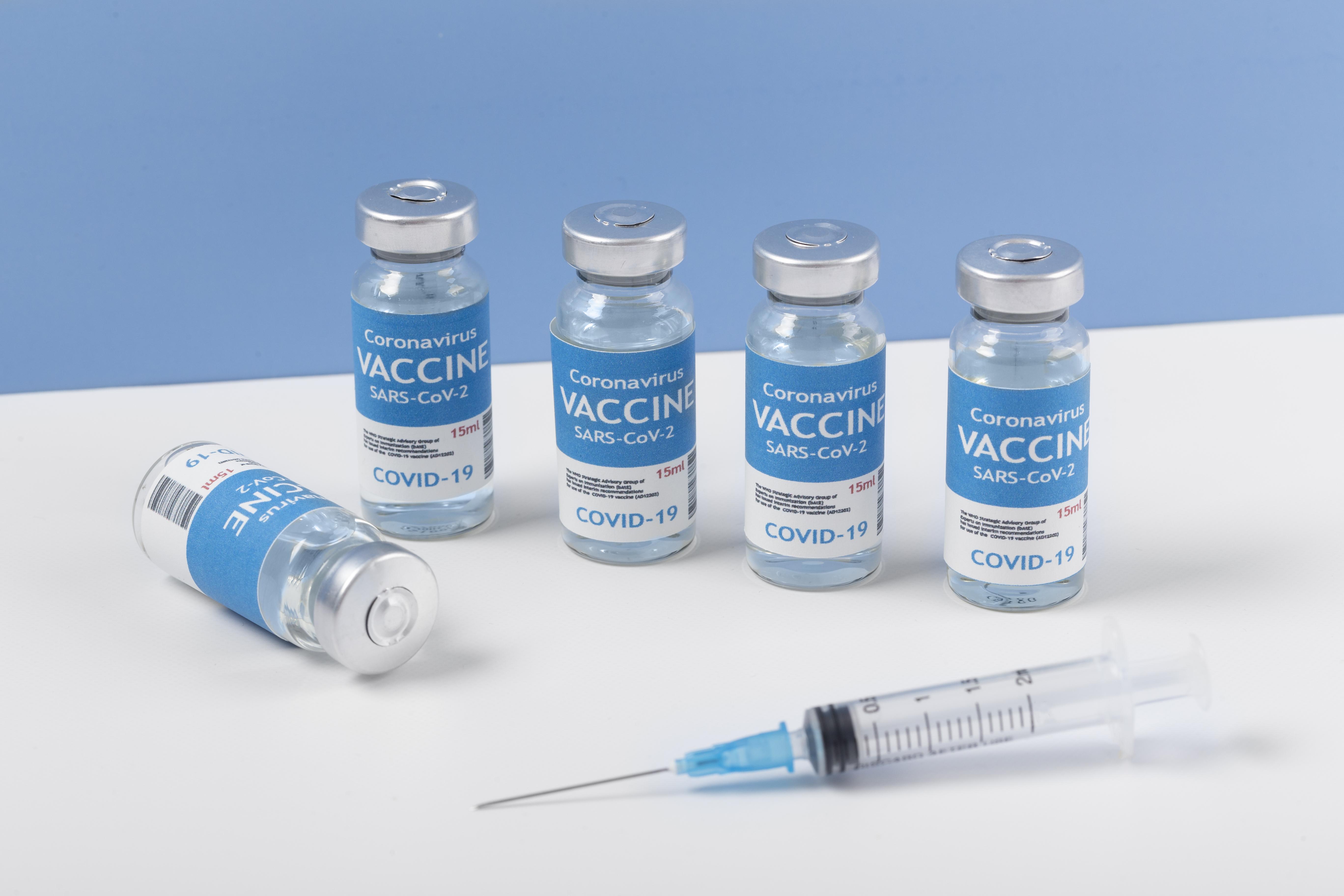 coronavirus-arrangement-with-vaccine-bottle-syringe